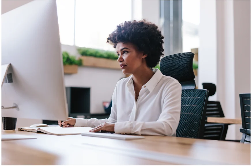 Professional woman working at a modern desk